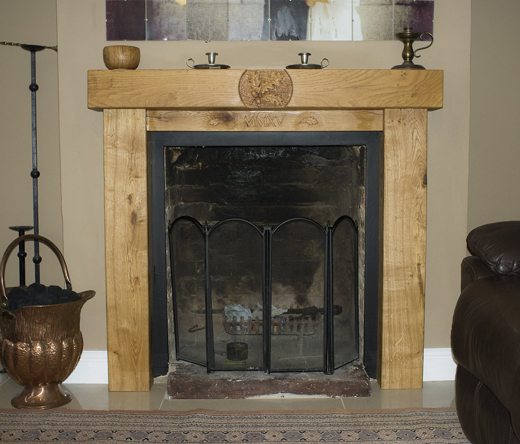 Carved oak fire surround