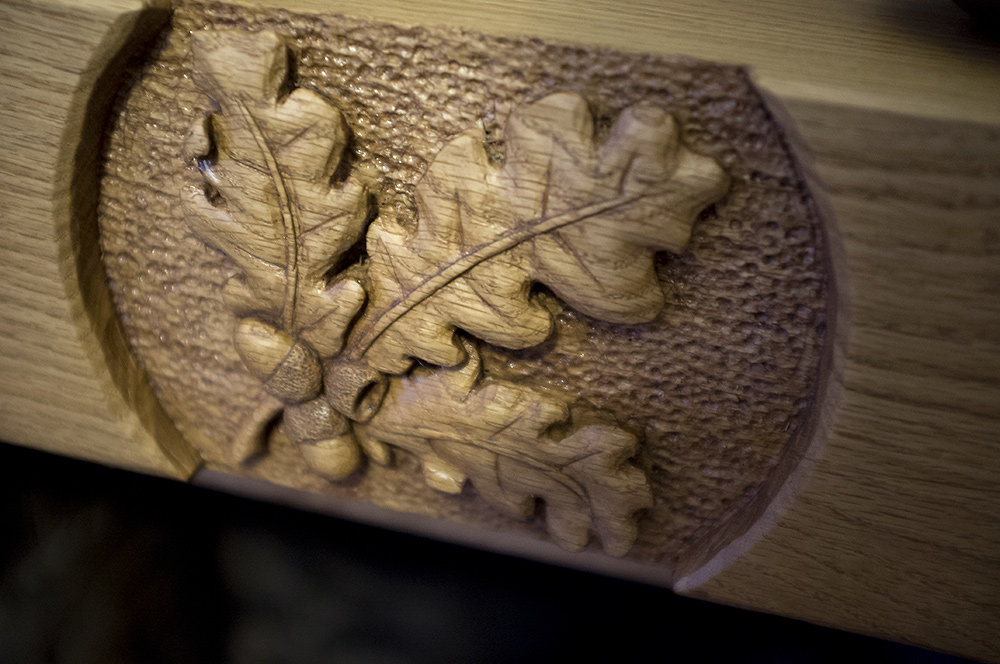 Carved oak fire surround
