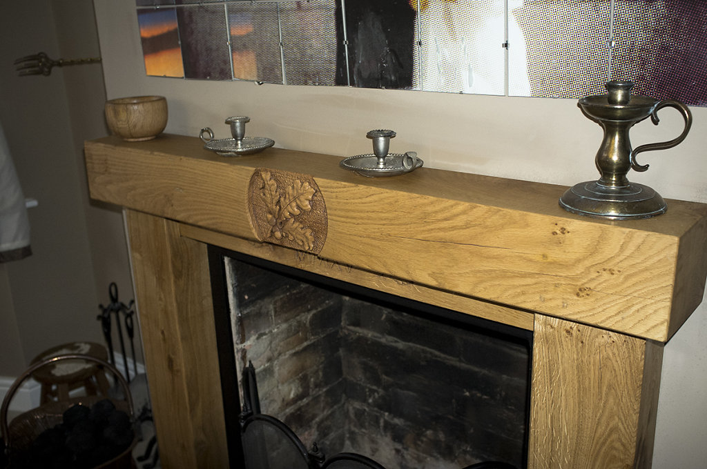 Carved oak fire surround